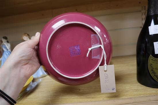 A Chinese ruby ground dish and a yellow dragon dish and two others largest diameter 26cm